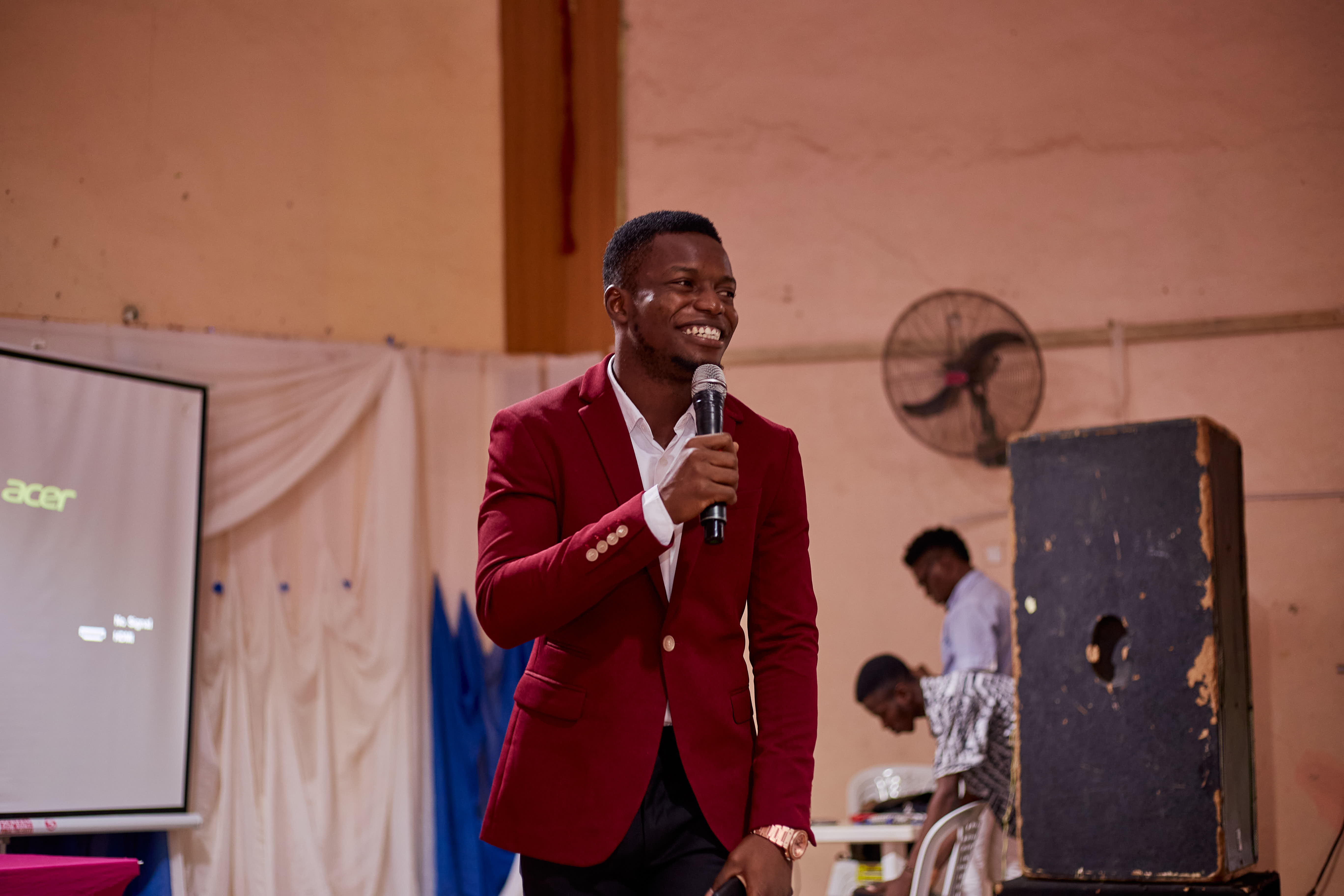 Evans Ademilua speaking at an event